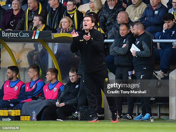 Nigel Clough, Manager of Burton Albion encourages his team during the Sky Bet League One match between Burton Albion and Gillingham at Pirelli...