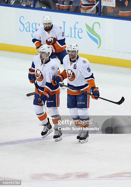 Shane Prince of the New York Islanders and John Tavares of the New York Islanders talk during pregame skate in Game Two of the Eastern Conference...