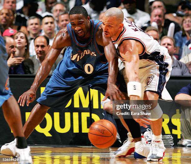 Jason Kidd of the New Jersey Nets steals the ball from Gilbert Arenas of the Washington Wizards on April 19, 2005 at Continental Airlines Arena in...
