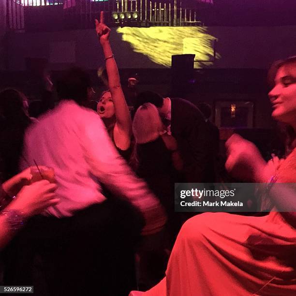 Men and women dance at a private party at Revel Casino in Atlantic City, NJ in October 2014.