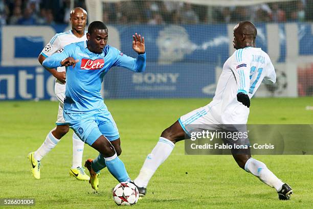 Duvan Zapata and Souleymane Diawara compete for the ball during the Champions League match between Olimpique de Marseille and SSC Napoli at Stadion...