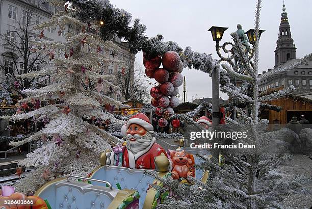 Copenhagen /Denmark- 21 November 2013 _Christmas tree decoration with artificial snow and real crystal ornaments at Christmas market at hojbro plads
