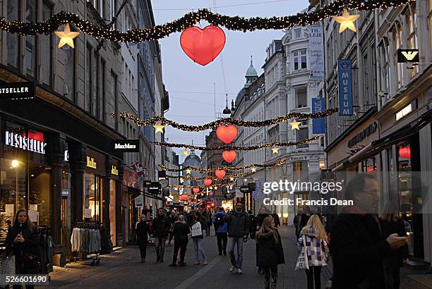 Copenhagen /Denmark- 23 November 2013 _Christmas tree decoration with artificial snow and real crystal ornaments at Christmas market at hojbro plads