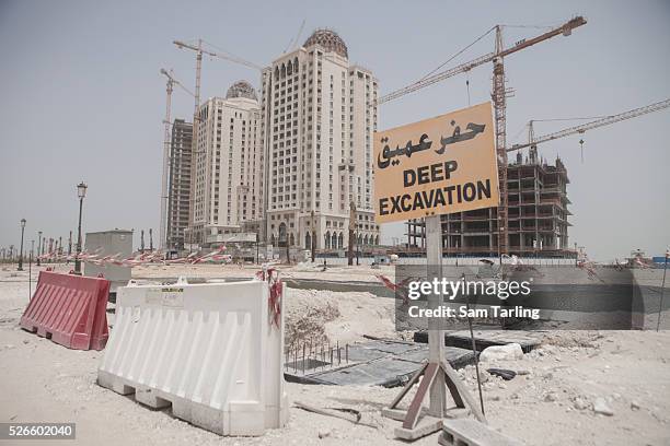 Massive construction projects underway at The Pearl in 2011, a man-made chain of islands standing on 985 acres of reclaimed land off the coast of...