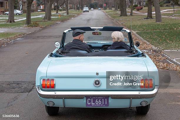 Tom and Gail Wise ride in her Skylight Blue 1964 1/2 Ford Mustang convertible in Park Ridge, Illinois November 26th, 2013. Gail Wise, then using her...