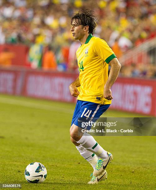 Brazil player Maxwell drives the ball during the Gillette Brazil Global Tour match between Brazil and Portugal. Brazil won the match with a score of...