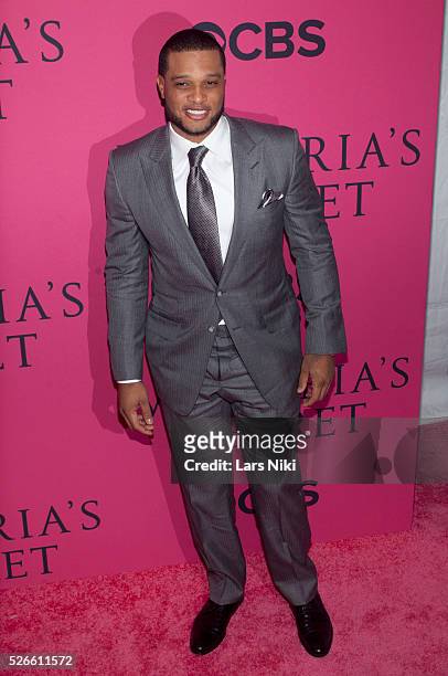Robinson Cano attends the 2013 Victoria's Secret Fashion Show Pink Carpet" at the Lexington Avenue Armory in New York City. �� LAN