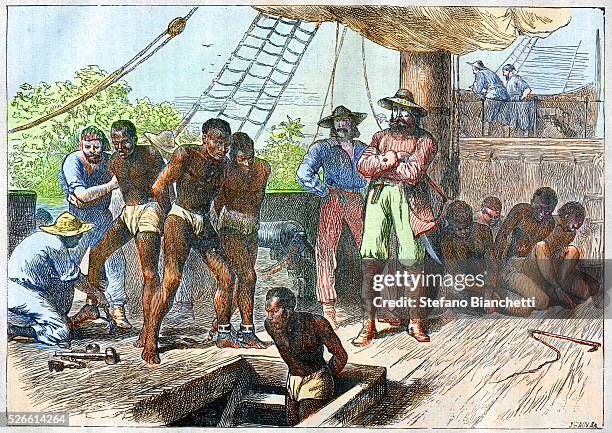 African slaves being taken on board ship bound for USA - engraving 1881