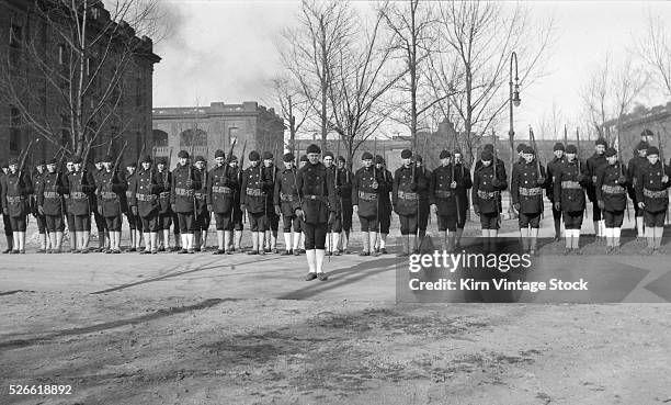 Navy recruits in formation on the grounds of Great Lakes Naval Training Station in North Chicago, Illinois before World War I.