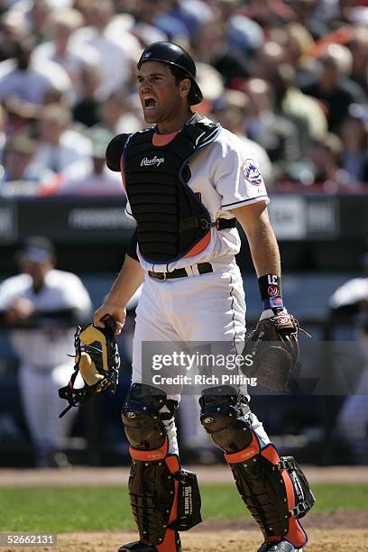 Mike Piazza of the New York Mets catches during the game against the Houston Astros at Shea Stadium on April 11, 2005 in Flushing, New York. The Mets...