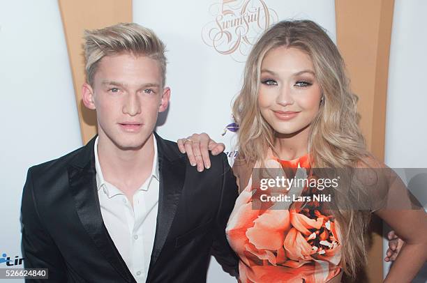 Cody Simpson and Gigi Hadid attend the Sports Illustrated 50th Anniversary Swimsuit 2014 Kickoff Event at the Swimsuit Beach House in New York City....