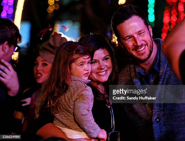 Actress Tiffani Thiessen shares a laugh with her daughter Harper and Husband Brady Smith during a Kids New Years Eve celebration at Legoland...