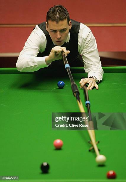 Quinten Hann of Australia in action during his first round match against Peter Ebdon at the Embassy World Snooker Finals at the Crucible Theatre on...