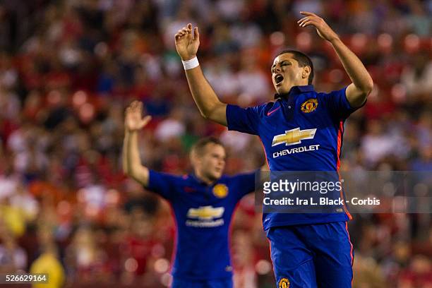 Manchester United player Javier "Chicharito" Hernandez reacts to a hit during Soccer, 2014 Guinness International Champions Cup Match between...