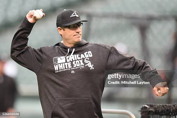 Robin Ventura of the Chicago White Sox throws batting practice before a baseball game against the Baltimore Orioles at Oriole Park at Camden yards on...