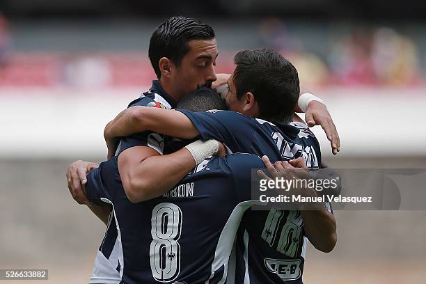 Dorlan Pabon of Monterrey celebrates with teammates after scoring the first goal of his team during the 16th round match between America and...
