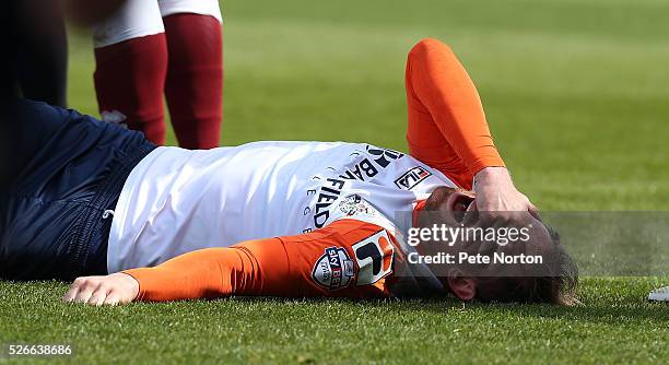 Danny Green of Luton Town after sustaining a serious leg injury during the Sky Bet League Two match between Northampton Town and Luton Town at...