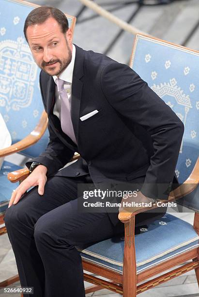 Crown Prince Haakon attend the Nobel Peace Prize award ceremony at Oslo City Hall.