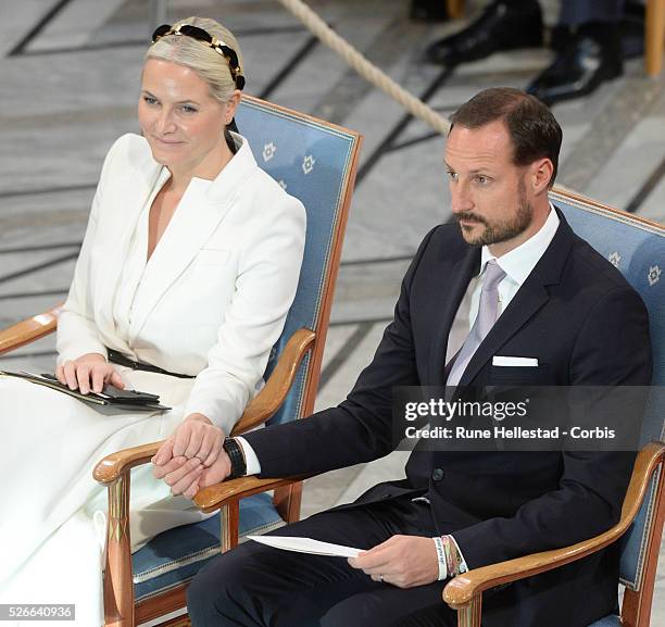 Crown Prince Haakon and Crown Princess Mette- Marit attend the Nobel Peace Prize award ceremony at Oslo City Hall.