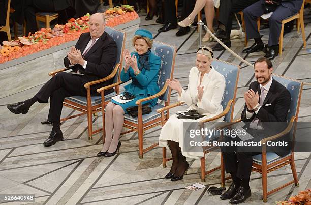 King Harald V, Queen Sonja, Crown Prince Haakon and Crown Princess Mette- Marit attend the Nobel Peace Prize award ceremony at Oslo City Hall.