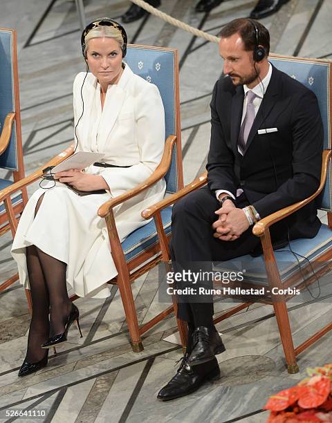 Crown Prince Haakon and Crown Princess Mette- Marit attend the Nobel Peace Prize award ceremony at Oslo City Hall.