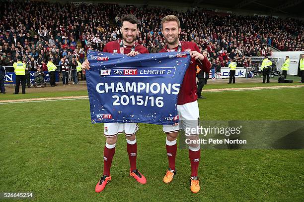 Brendan Moloney and Joel Byrom celebrate after Sky Bet League Two match between Northampton Town and Luton Town at Sixfields Stadium on April 30,...