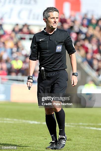 Referee Darren Bond in action during the Sky Bet League Two match between Northampton Town and Luton Town at Sixfields Stadium on April 30, 2016 in...