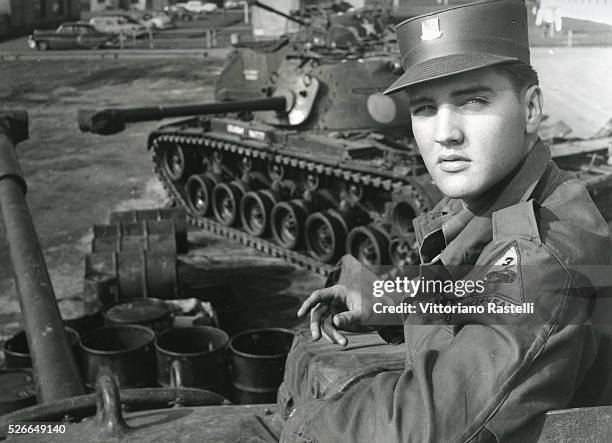 American singer and actor Elvis Presley, aka "The King", posing during his military service at a US base in Germany.