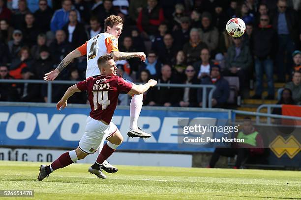 Glen Rea of Luton Town contests the ball with Sam Hoskins of Northampton Town during the Sky Bet League Two match between Northampton Town and Luton...