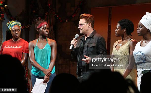 Lupita Nyong'o, Bono and the cast of Broadway's "Eclipsed" onstage as Bono visits "Eclipsed" to launch a dedication series in honor of abducted...