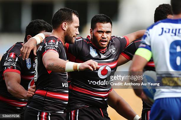 Sam Lisone of the Warriors prepares for a scrum with teammate Bodene Thompson during the round nine NSW Intrust Super Cup Premiership match between...