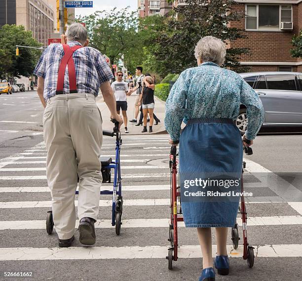 An elderly couple waits to crosses the street in the New York neighborhood of Chelsea on Saturday, June 14, 2014. Social Security, considered a major...