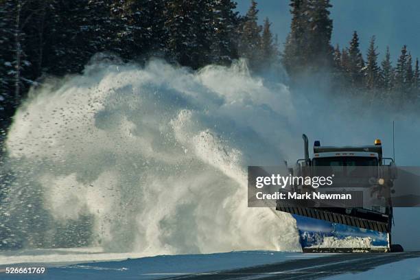 snowplow blowing snow off road - removedor de neve snow mobile - fotografias e filmes do acervo