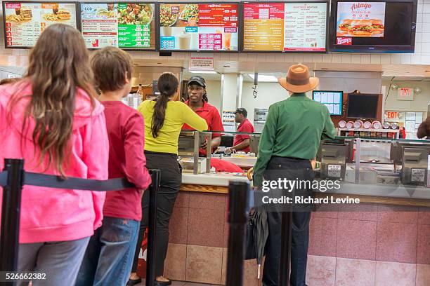 Customers on line at a busy Wendy's fast food restaurant in New York on Wednesday, May 6, 2015. Wendy's announced that that is will only use...