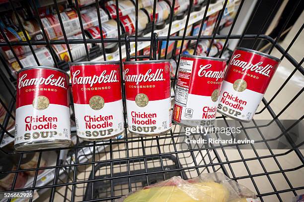Cans of Campbell's iconic Chicken Noodle Soup are seen in a supermarket in New York on Tuesday, November 10, 2015. The Campbell Soup Co. Announced...