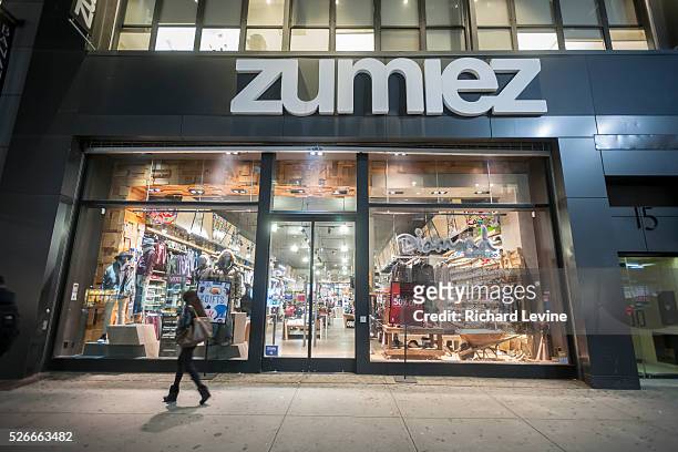 Shoppers pass a Zumiez store in Herald Square in New York on Tuesday, January 12, 2016. Zumiez announced that it has partnered with Starmount to...