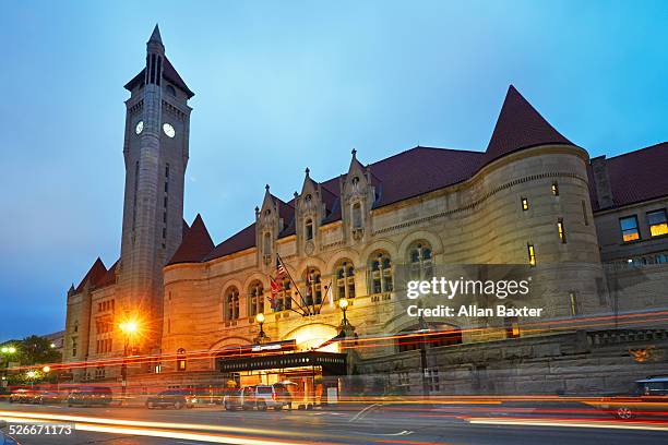 facade of st louis union station at dusk - union station saint louis stock pictures, royalty-free photos & images