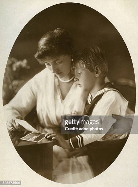 Princess Alexandra Victoria of Schleswig-Holstein-Sonderburg-Gl��cksburg , with her son Prince Alexander Ferdinand of Prussia . Ca. 1920.