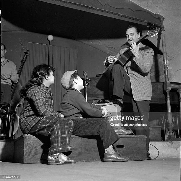 Django Reinhardt , Gypsy jazz guitarist. In 1948.