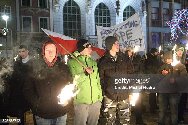 Anti-immigrants rally in Gdansk city centre. Dozen far-right activists from ONR and Mlodziez Wszechpolska organizations shouted racist slogans and...