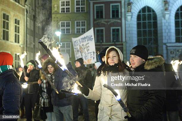 Anti-immigrants rally in Gdansk city centre. Dozen far-right activists from ONR and Mlodziez Wszechpolska organizations shouted racist slogans and...