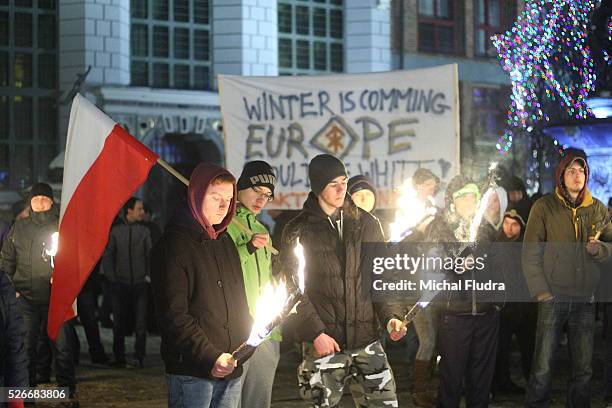 Anti-immigrants rally in Gdansk city centre. Dozen far-right activists from ONR and Mlodziez Wszechpolska organizations shouted racist slogans and...