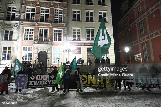 Anti-immigrants rally in Gdansk city centre. Dozen far-right activists from ONR and Mlodziez Wszechpolska organizations shouted racist slogans and...