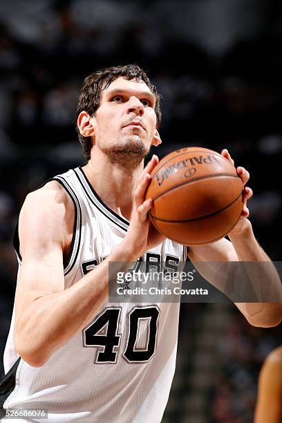 Boban Marjanovic of the San Antonio Spurs shoots a free throw during the game against the Oklahoma City Thunder in Game One of the Western Conference...