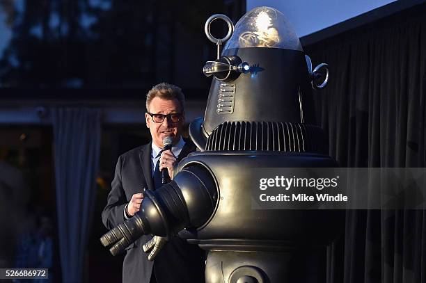 Actor Greg Proops and Robby the Robot attend 'Forbidden Planet' screening during day 3 of the TCM Classic Film Festival 2016 on April 30, 2016 in Los...