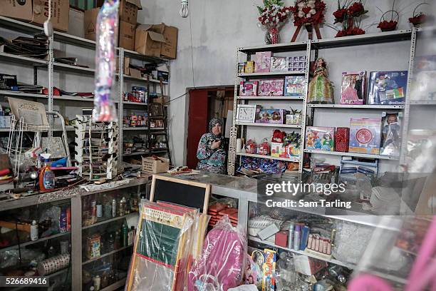 Hayat Kheir Imriri recently took a micro-finance loan for $800 dollars to buy stock for her store in the Sabra Palestinian refugee camp, Beirut,...