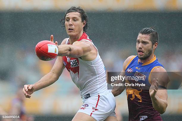 Stefan Martin of the Lions and Kurt Tippett of the Swans compete for the ball during the round six AFL match between the Brisbane Lions and the...