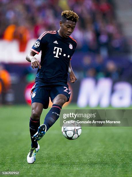 Kingsley Coman of Bayern Munich controls the ball during the UEFA Champions League Semi Final first leg match between Club Atletico de Madrid and FC...