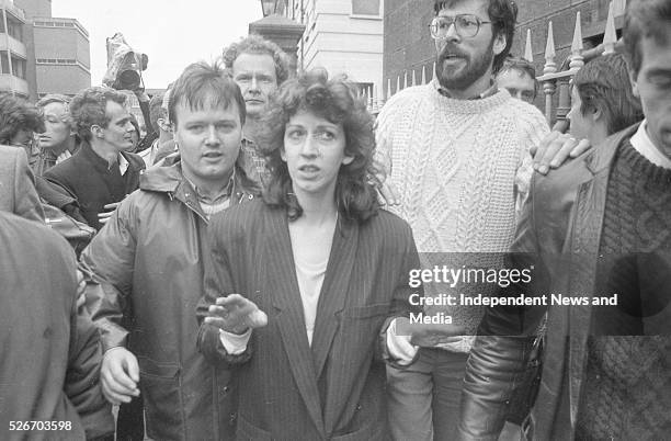 Evelyn Glenholmes leaving court and arrest in Princess St Dublin with Gerry Adams and Martin McGuinness circa August 1986 .