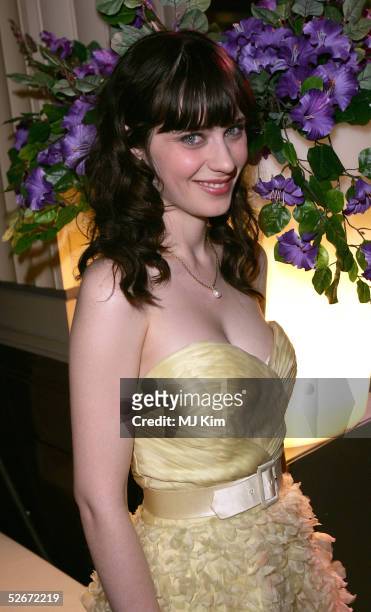 Actress Zooey Deschanel attends the aftershow party following the world premiere of the film "The Hitchhiker's Guide to the Galaxy" at Freemasons...